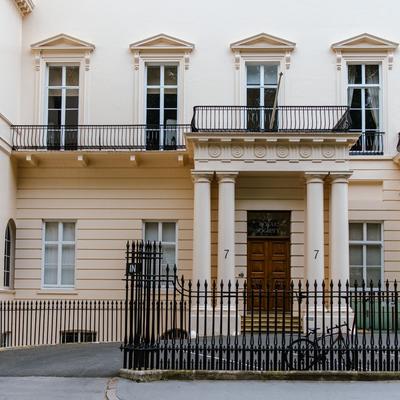 Photo of the exterior of the Royal Society, a classical building.