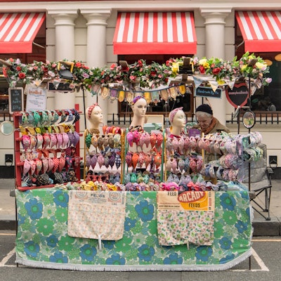 A colourful market stall on Portobello Road selling headbands