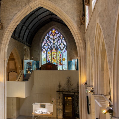 A view of the interior of the museum showing a stained glass window