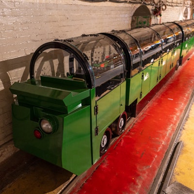 Photo of a small train that carries visitors