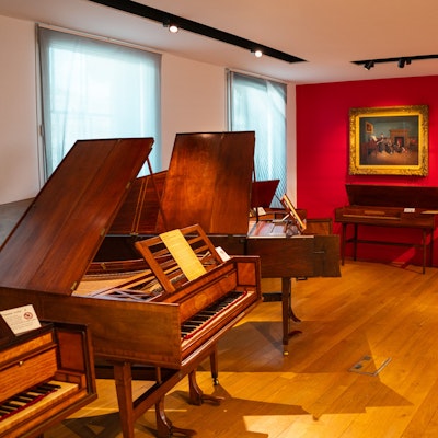 Photo of some pianos in the Royal Academy of Music Museum.