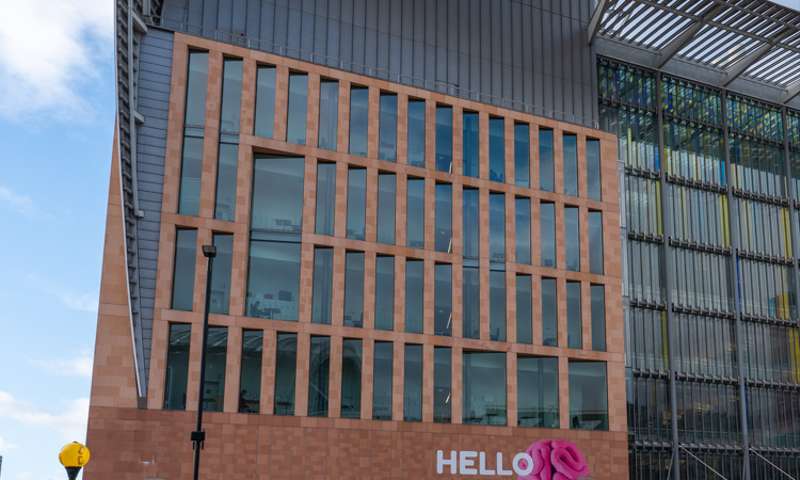 Photo of the Francis Crick Institute, a huge modern building. Parts of it are out of frame.
