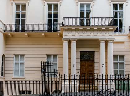 Photo of the exterior of the Royal Society, a classical building.