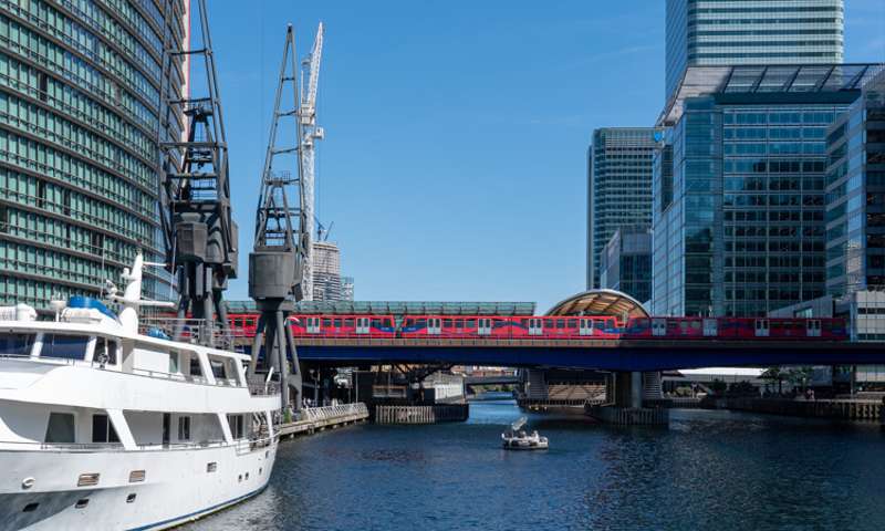 View over North Dock in Canary Wharf, with skyscrapers in the background.