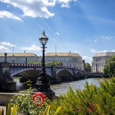 Photo of lambeth bridge with a lamp in the foreground