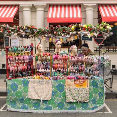 A colourful market stall on Portobello Road selling headbands