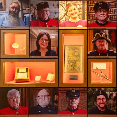 Photographs of chelsea pensioners on a wall, with some items in display cases.