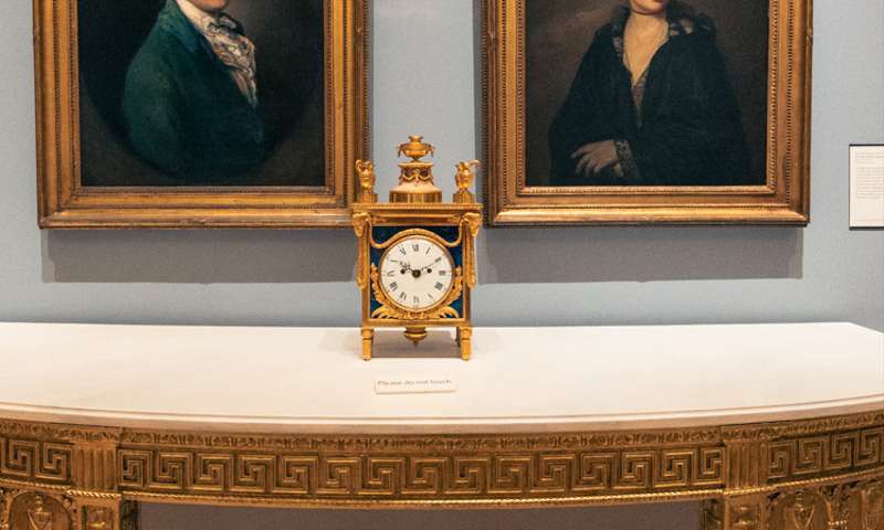 A clock and two portraits in the Courtauld Gallery