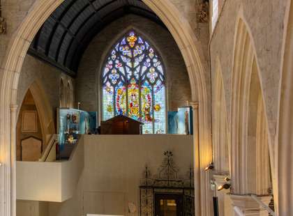 A view of the interior of the museum showing a stained glass window