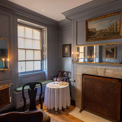 A corner of a wood panelled room in Handel's House