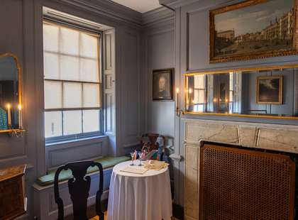 A corner of a wood panelled room in Handel's House