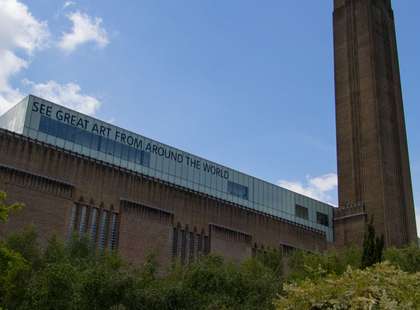 The Tate Modern - a large art deco brick building with a chimney