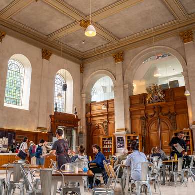 Photo of the inside of the café, a city church.