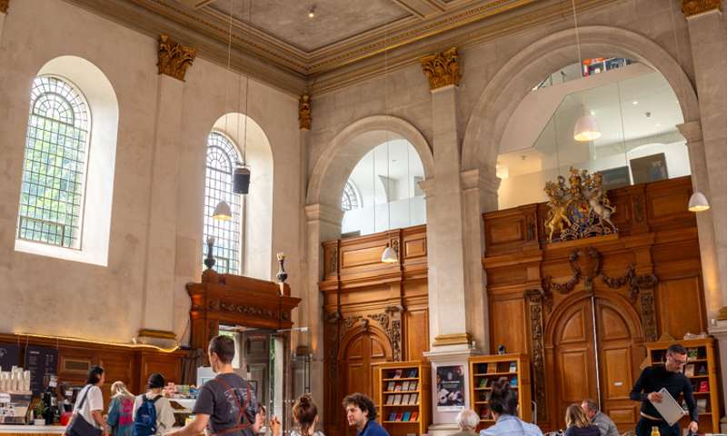 Photo of the inside of the café, a city church.